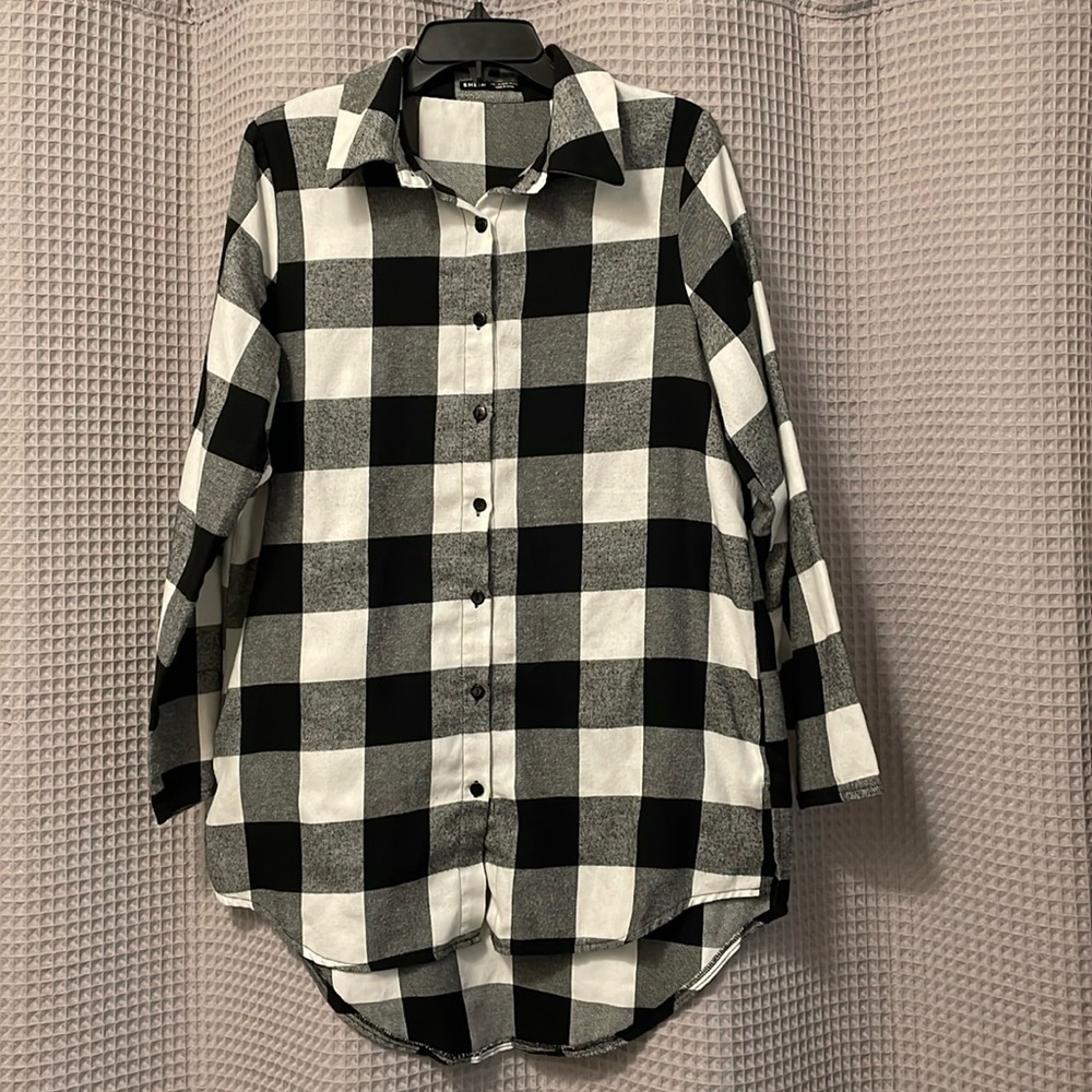 Long plaid sweater.